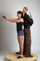 2021 01 OXANA AND XENIA STANDING POSE WITH GUNS 4 (2)